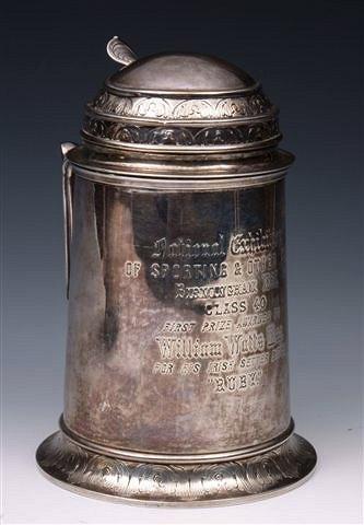 Appraisal: A VICTORIAN SILVER LIDDED TANKARD with engraved inscription Birmingham by