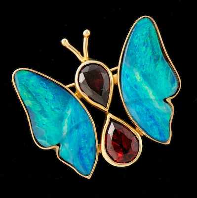 Appraisal: A Black Opal and Garnet Butterfly Brooch Mounted in k