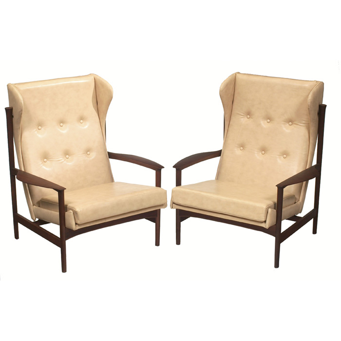 Appraisal: Selig Danish Modern high-back lounge chairs pair walnut frames with