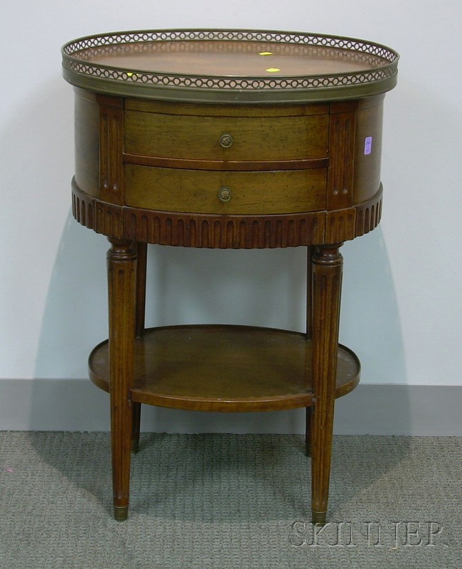 Appraisal: Louis XVI Style Oval Walnut Two-Drawer Stand with Brass Gallery