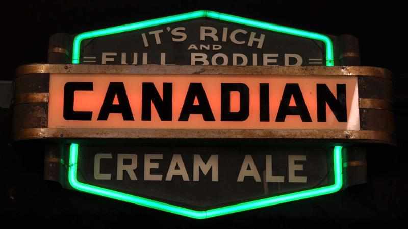 Appraisal: Canadian Can Neon Sign Description s Green and red neon