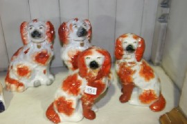 Appraisal: Two pairs of Staffordshire spaniels each with iron red markings