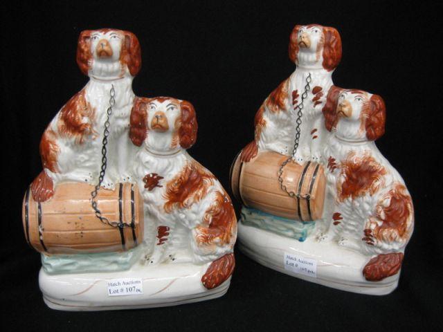 Appraisal: Pair of Staffordshire Pottery Dog Figurines spaniels with barrel one