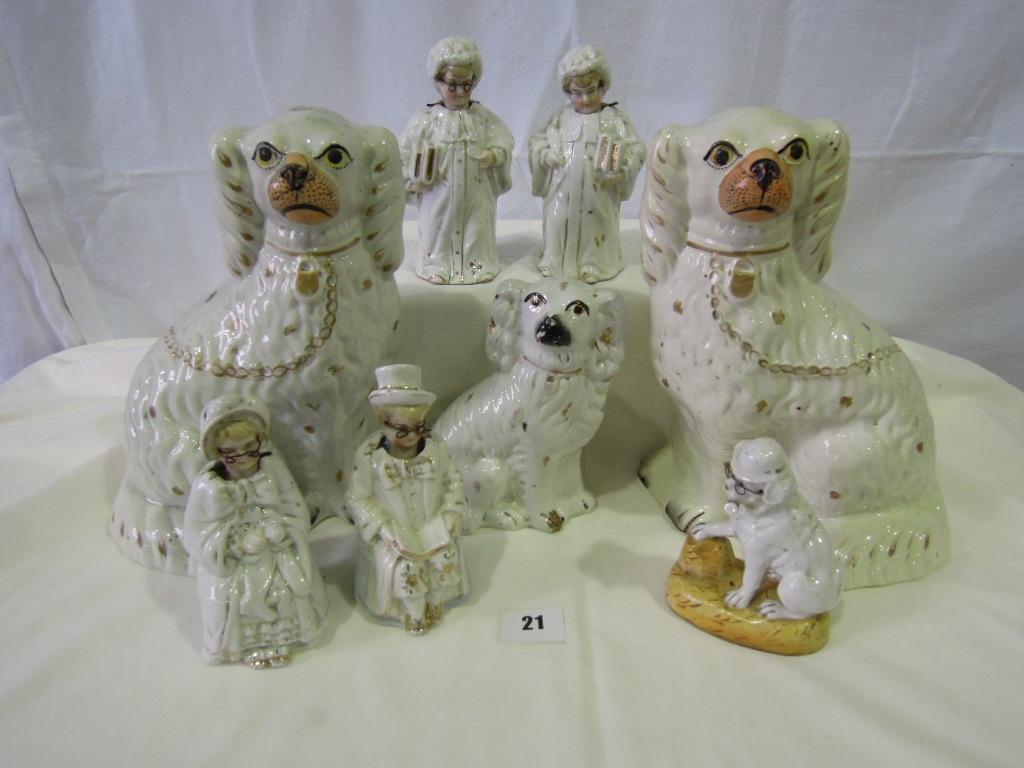 Appraisal: A pair of th century Staffordshire Spaniels with gilt patches