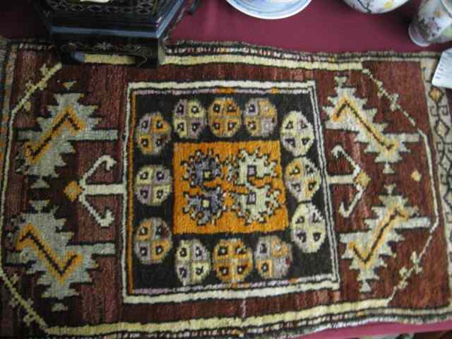 Appraisal: Turkish Handmade Mat interesting geometrics earthtones ' '' x '