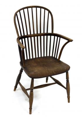 Appraisal: A Windsor type stick back armchair with dished elm seat