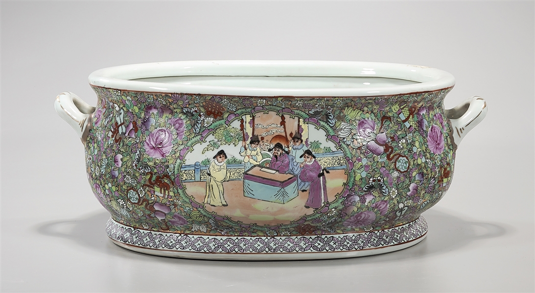 Appraisal: Tall Chinese enameled porcelain handled basin depicting scenes of figures