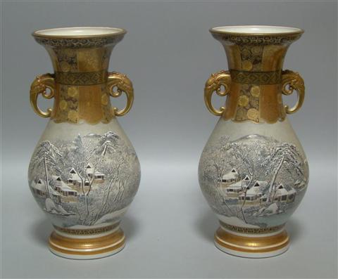 Appraisal: PAIR OF KUTANI VASES Signed Kutani enclosed within a prunus