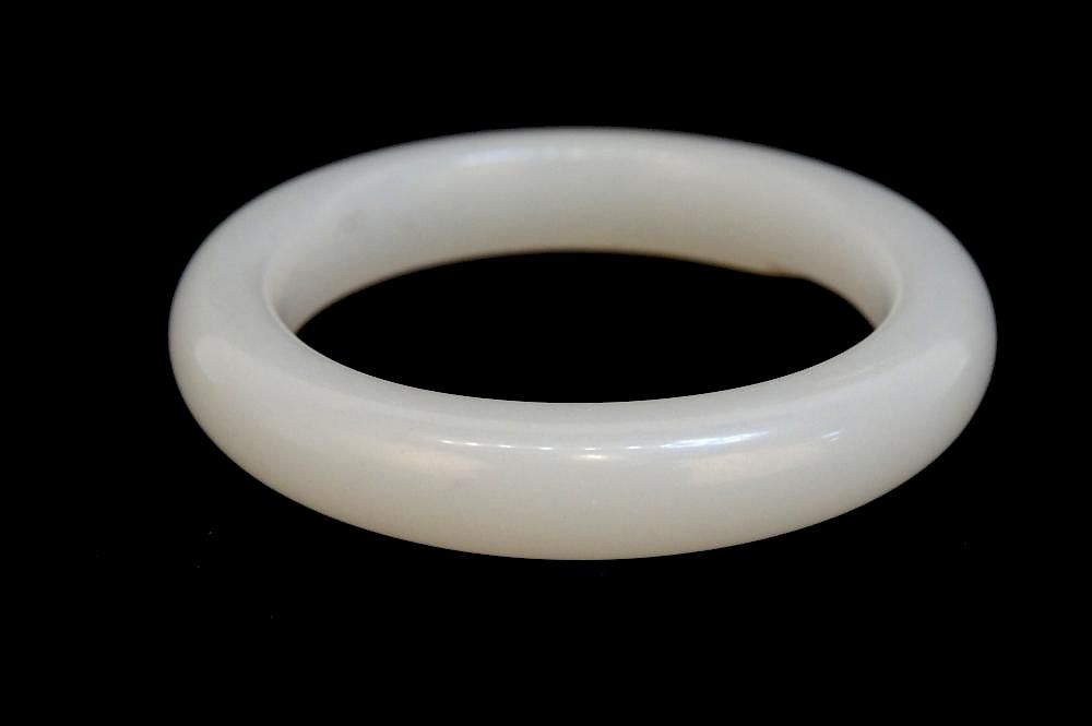 Appraisal: White Jade Bangle White Jade Bangle Description White jade bangle