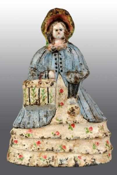 Appraisal: Cast Iron Lady with Hatbox Purse Doorstop Description Early casting