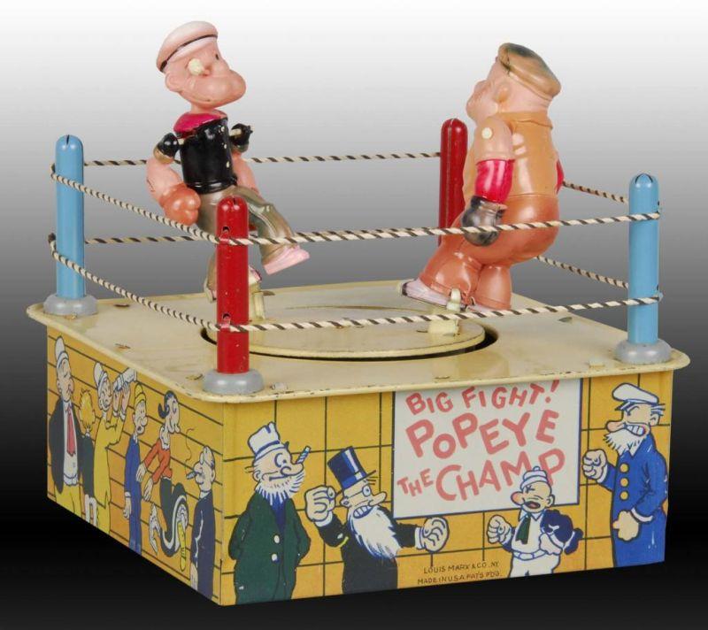 Appraisal: Marx Wind-Up Popeye the Champ Toy Description Tin and celluloid