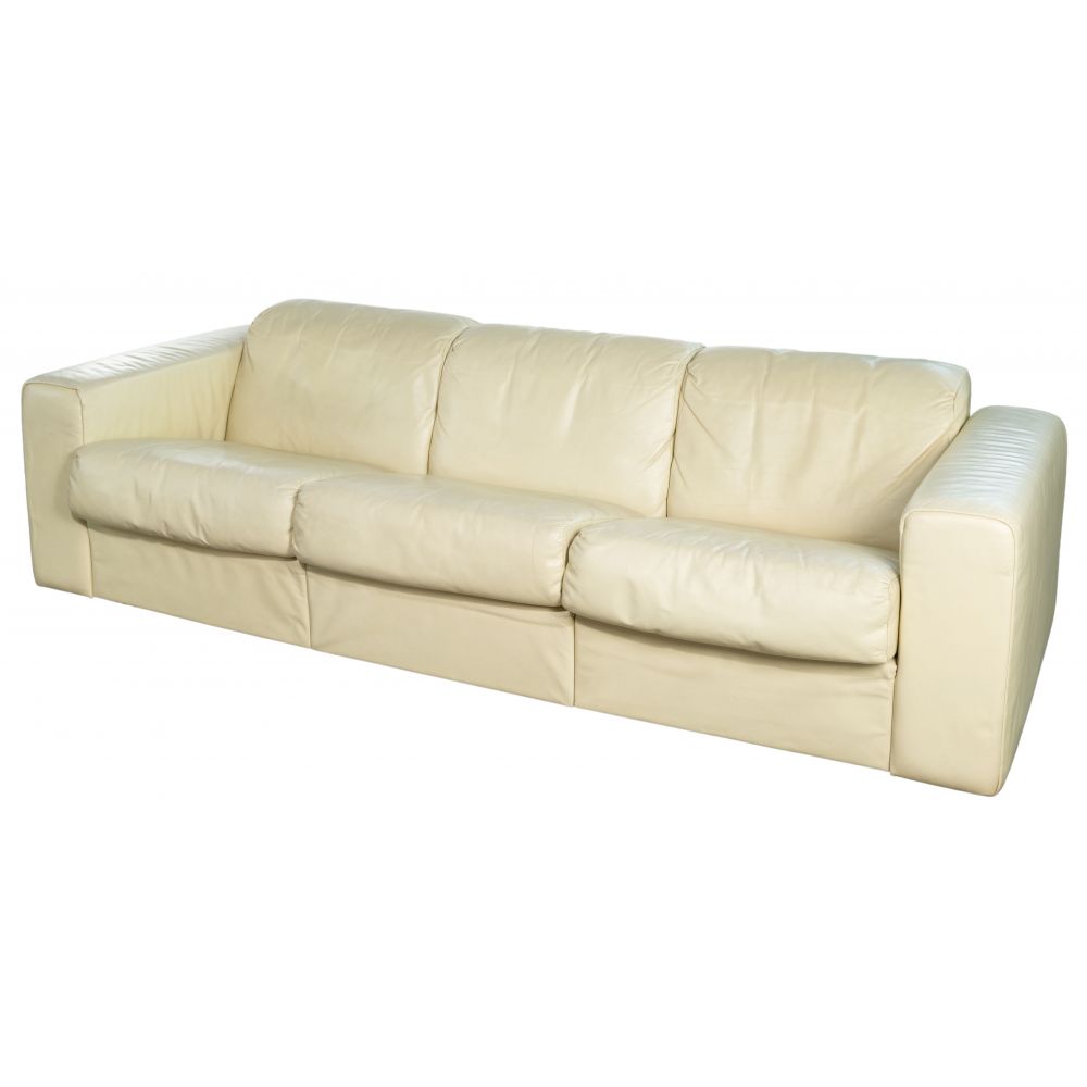 Appraisal: STENDIG INDUSTRIES LEATHER SOFAEcru cream leather sofa having a cube