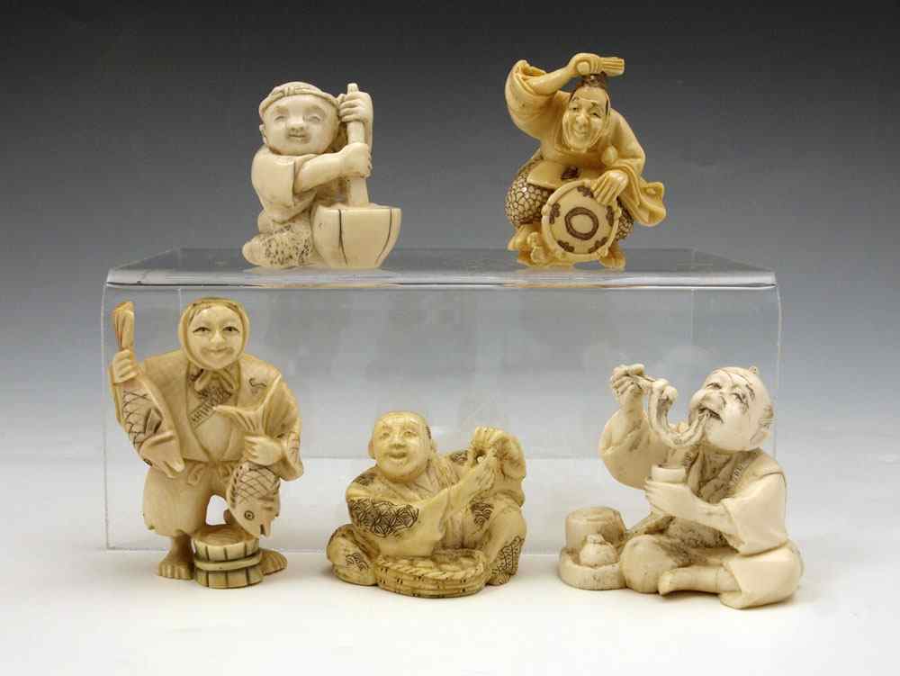 Appraisal: PIECE CARVED IVORY FIGURES NETSUKE To include Man sitting on