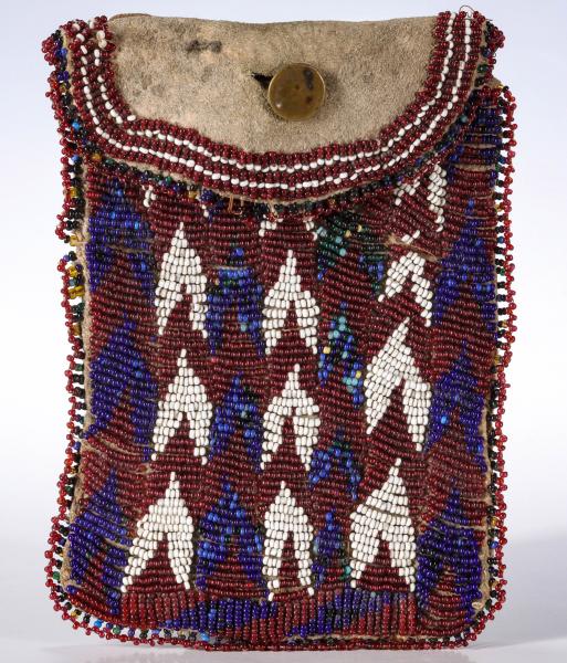 Appraisal: AN APACHE BEADED STRIKE-A-LIGHT POUCH CIRCA The native tanned hide