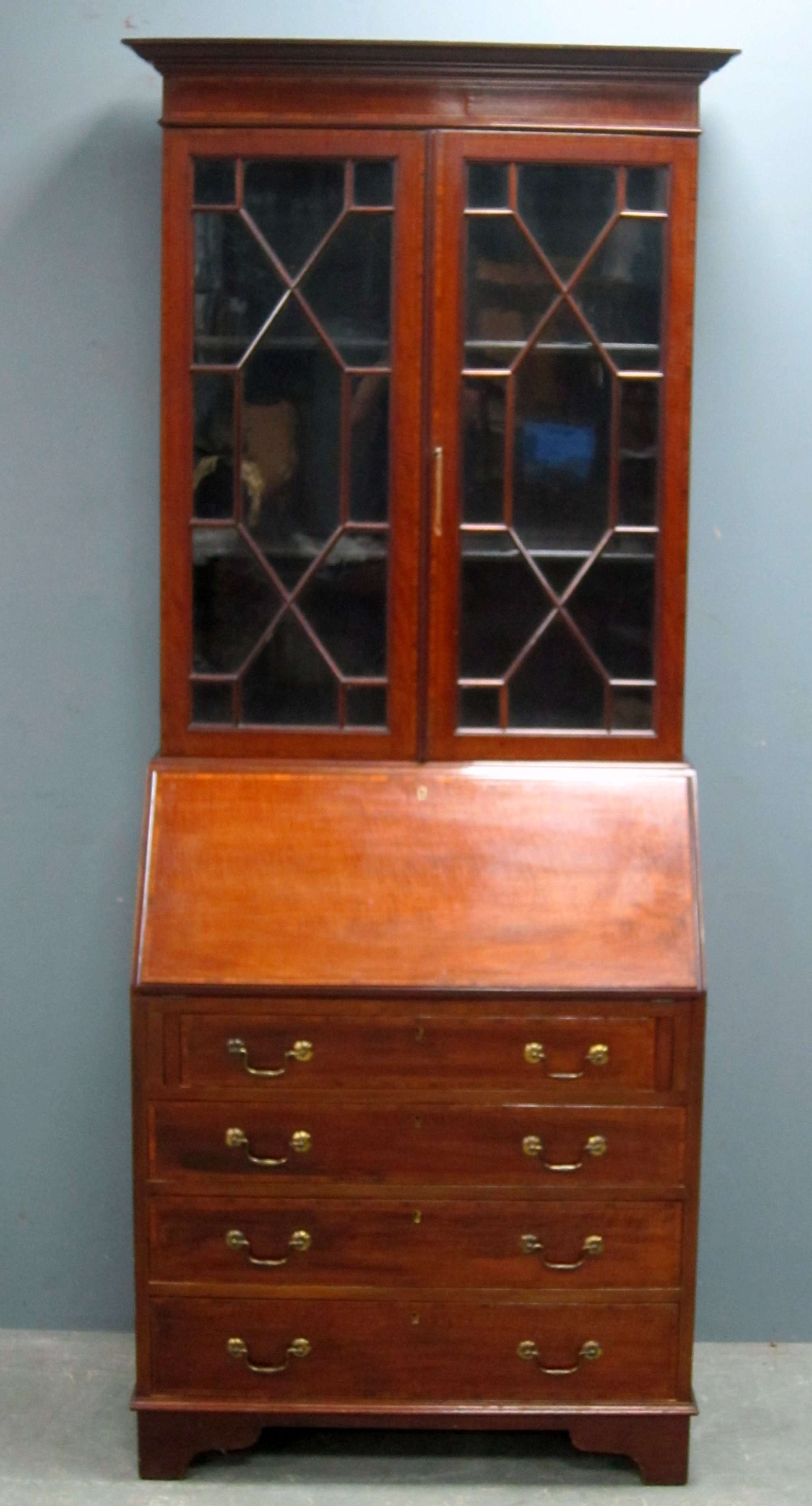 Appraisal: Early th century mahogany bureau bookcase top with two glazed