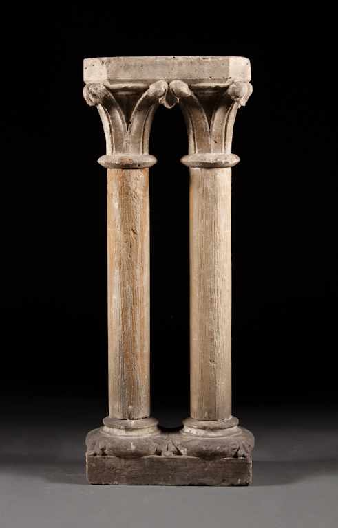 Appraisal: Pair of French carved stone columnar architectural elements with Corinthian