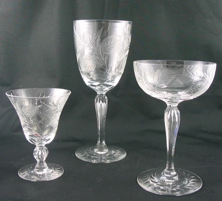 Appraisal: THREE SETS OF CRYSTAL STEMWARE in matching cut and engraved