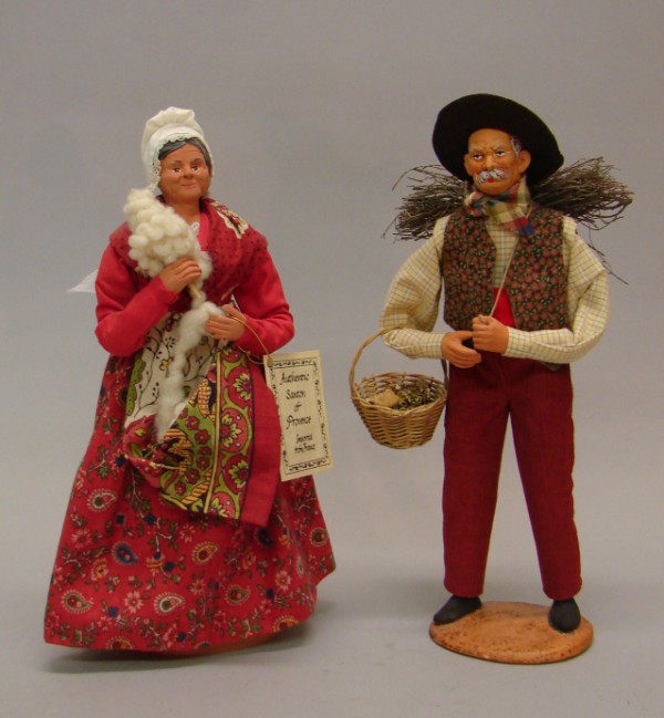 Appraisal: Pair of Santon dolls Female is holding wool and the