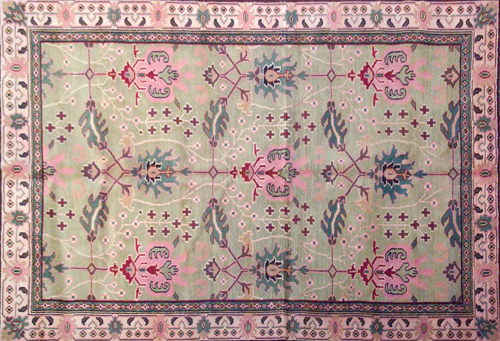 Appraisal: WILLIAM MORRIS STYLE Area rug with pink and green blossoms