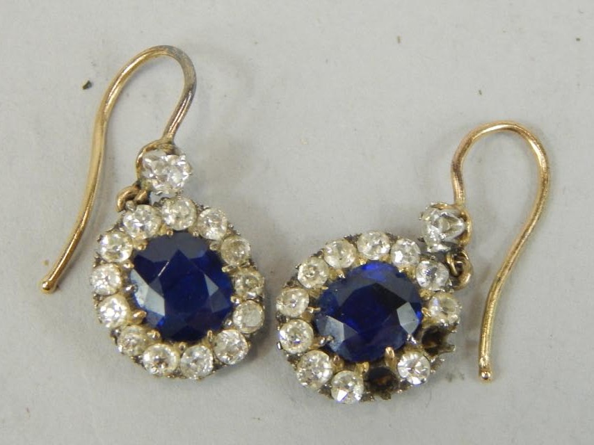 Appraisal: A pair of stone set earrings set with blue and