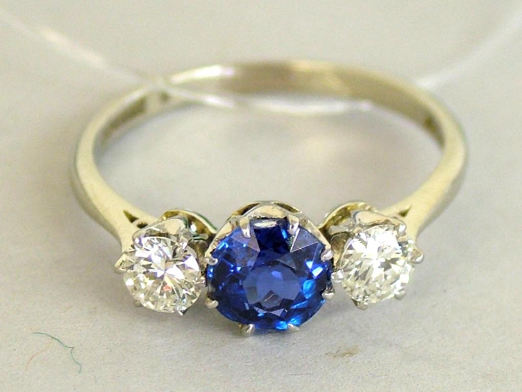 Appraisal: ct gold and platinum mounted sapphire and diamond three stone