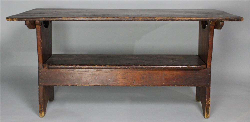 Appraisal: RED STAINED PINE SETTLE TABLE shaped pivoting top above a