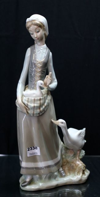 Appraisal: A Lladro figure of a girl with geese cm high