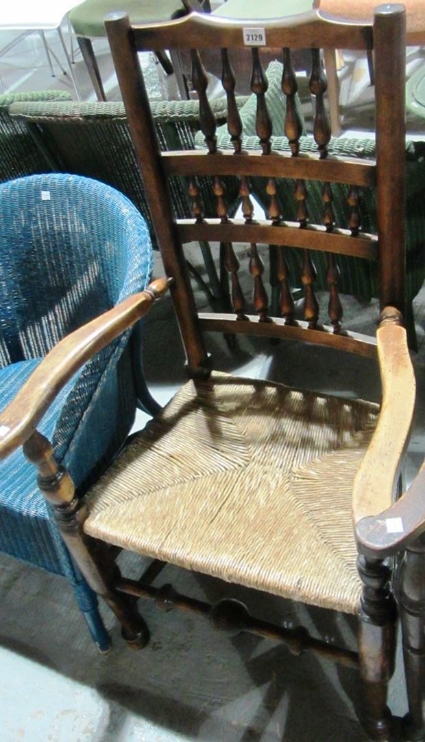 Appraisal: A th century oak and ash spindle back carver chair