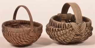 Appraisal: Two Miniature Berry Baskets Bentwood handles bentwood wrapped rims both