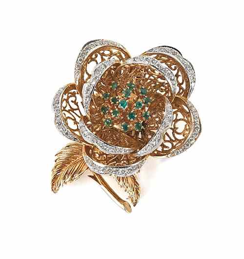 Appraisal: K yellow gold moveable pin of a blooming flower with