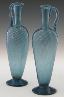 Appraisal: Near Pair of Blue Blown Glass Footed Ewers th c