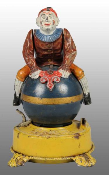 Appraisal: Cast Iron Clown on Globe Mechanical Bank Description Manufactured by