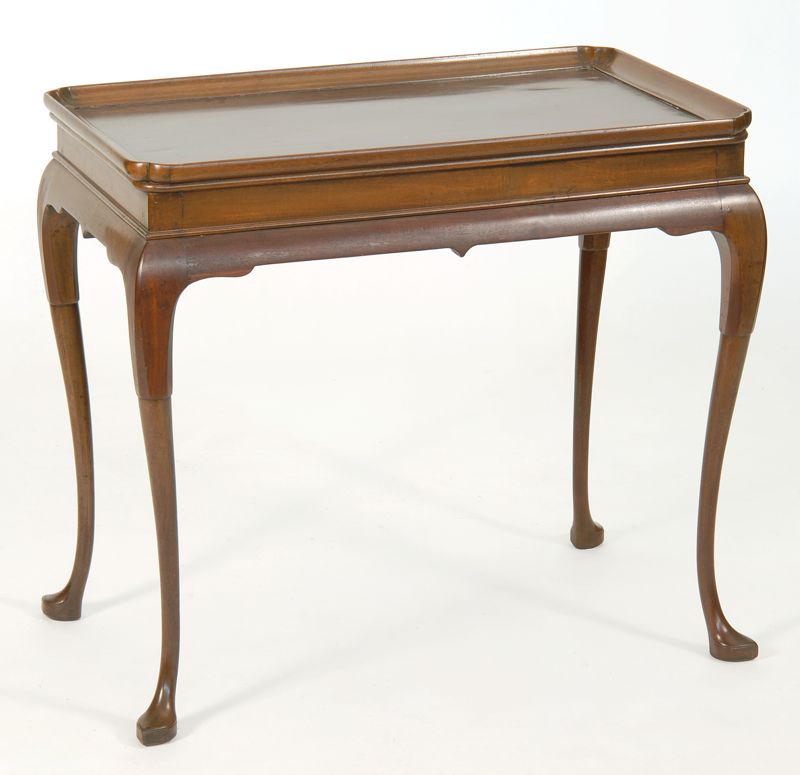 Appraisal: QUEEN ANNE-STYLE TEA TABLE Centennial Period or EarlierIn mahogany with