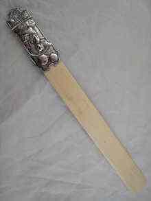 Appraisal: A silver handled ivory page turner hallmarked Birmingham approx cm