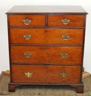 Appraisal: English Georgian over chest of drawers in mahogany On bracket