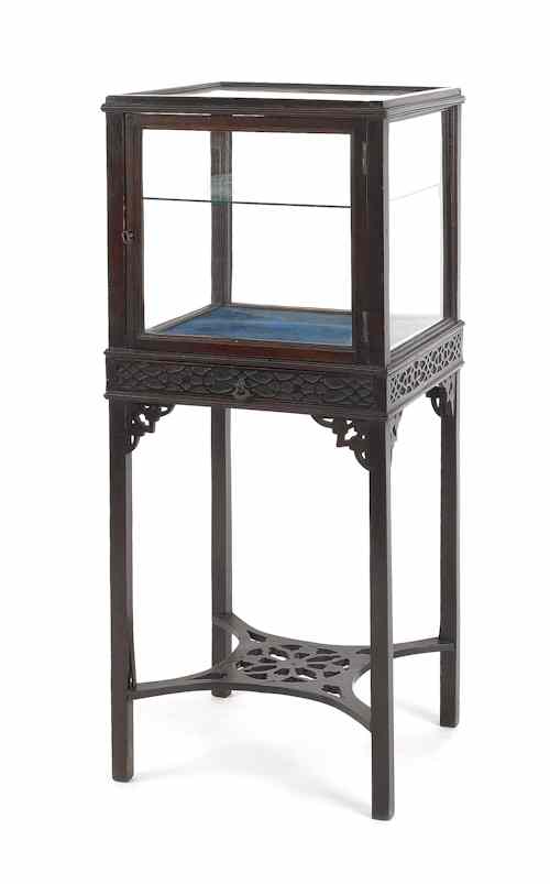 Appraisal: George III mahogany display stand ca with blind fretwork decoration