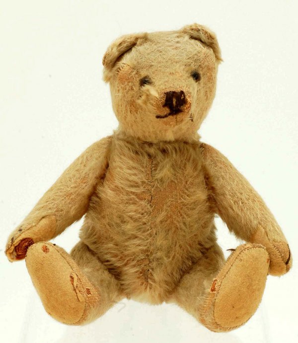 Appraisal: A small golden mohair teddy bear Floss vertically stitched nose