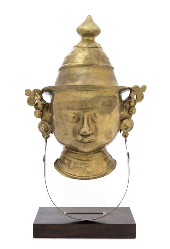 Appraisal: Sale Lot An Indian Brass Mask of Parvati th th