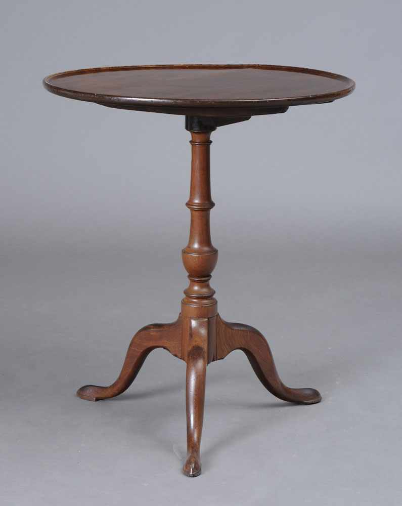 Appraisal: AMERICAN CHIPPENDALE CARVED MAHOGANY TILT-TOP TEA TABLE The dished top