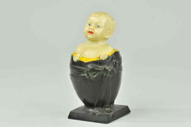 Appraisal: BABY IN EGG MECHANICAL BANK Sometimes referred to as the