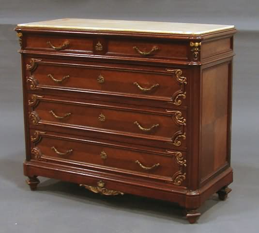 Appraisal: Pale peach colored marble top small drawers over wide drawers