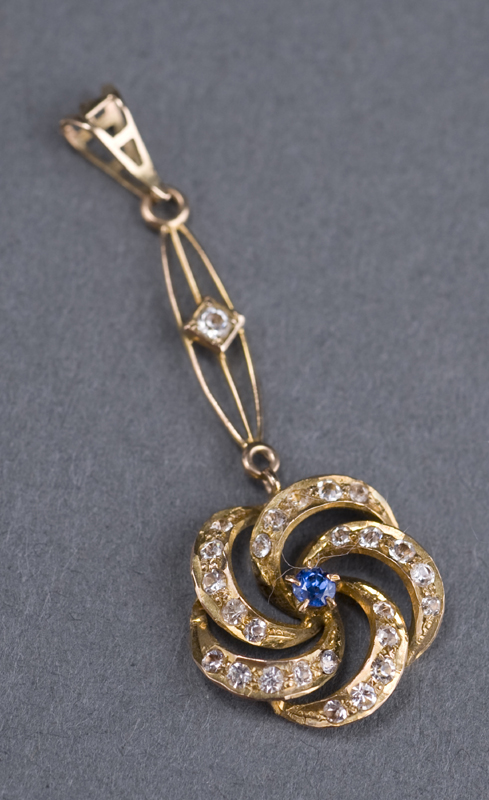 Appraisal: KT yellow gold pendant with diamonds and blue sapphire Pendant