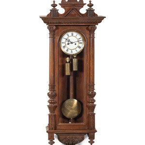 Appraisal: A Walnut Case Wall Clock th Century Height x width