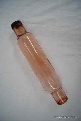 Appraisal: Vintage Pink Blown Glass Rolling Pin w CapNot labeled or