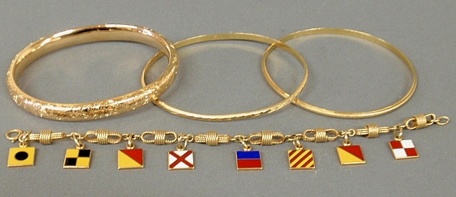 Appraisal: - Four k yg bracelets narrow bangles- oval x round