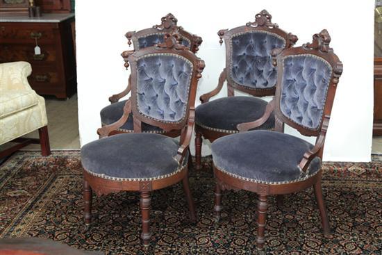 Appraisal: FOUR VICTORIAN SIDE CHAIRS Mahogany with carved crests drop finials