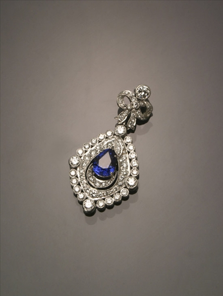 Appraisal: -Karat White-Gold Blue Sapphire and Diamond Pendant Set with one