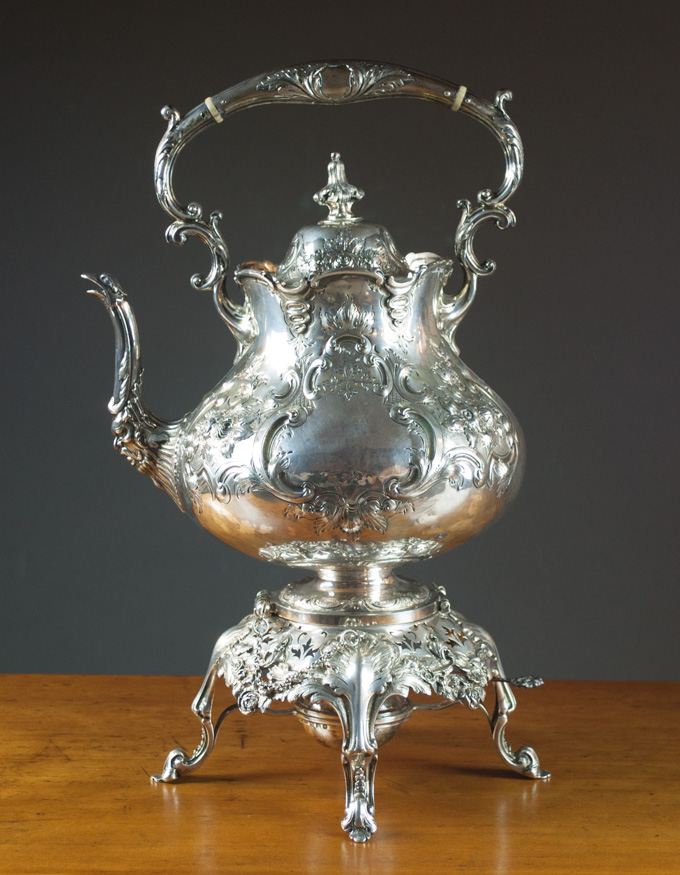 Appraisal: ENGLISH STERLING SILVER TEA KETTLE ON WARMING STAND with repousse