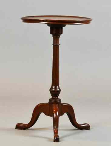 Appraisal: An American Mahogany Plant StandWith raised rim circular top turned