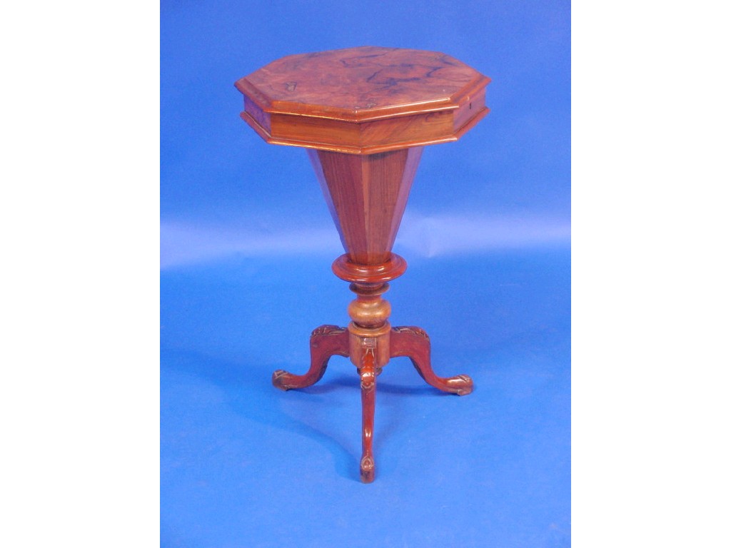 Appraisal: A Victorian walnut trumpet work table with tripod base